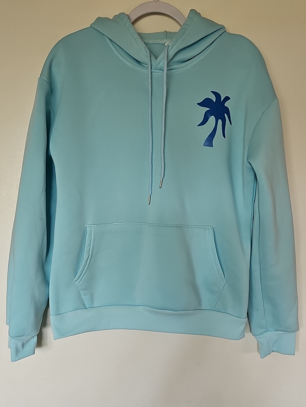 Womans Light Blue Pullover Hoodie with Palm Motif